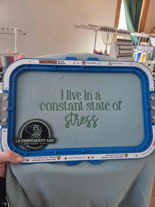 i live in a constant state of stress Embroidered Crewneck Sweatshirt