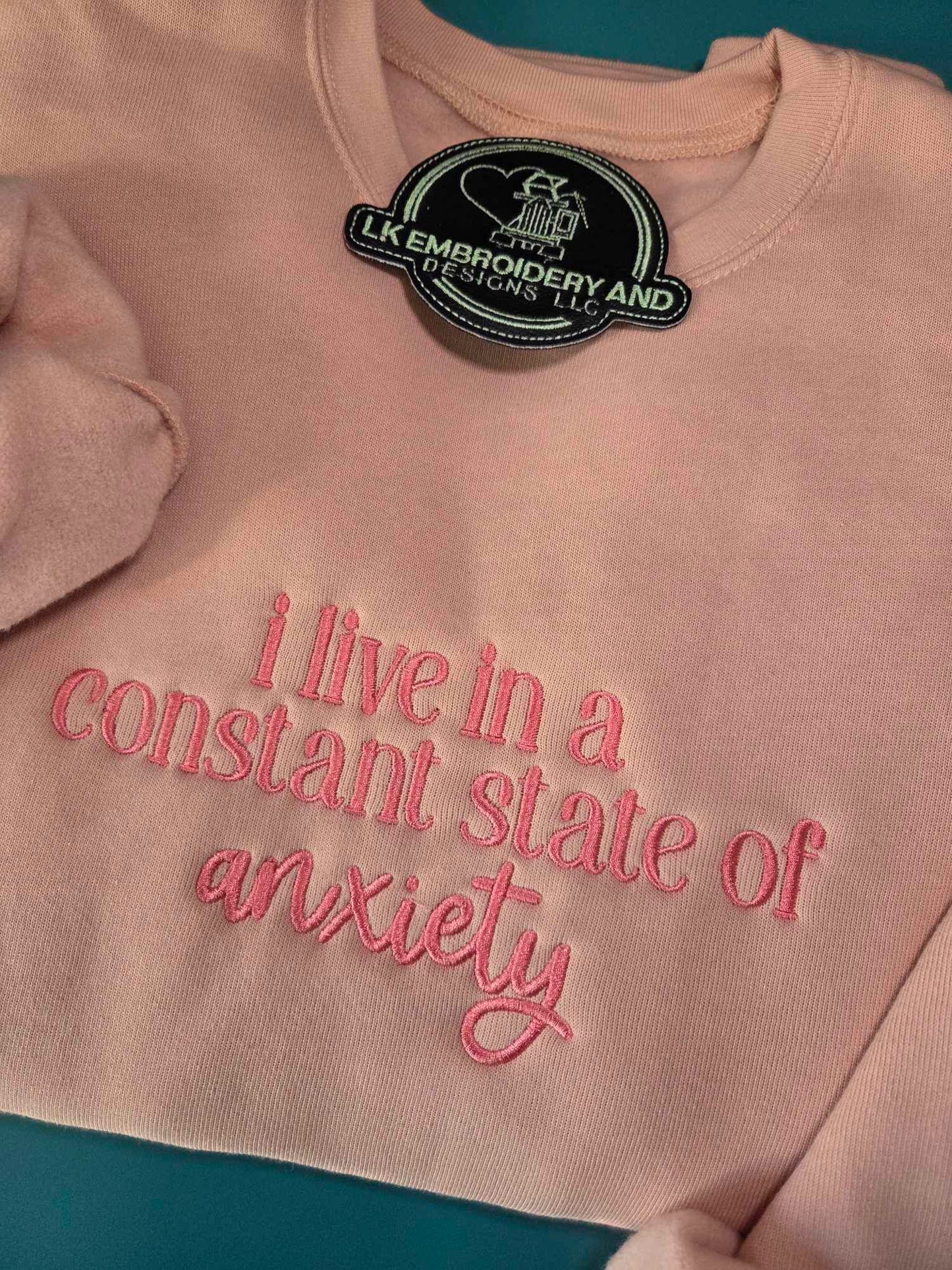 i live in a constant state of anxiety Embroidered Crewneck Sweatshirt