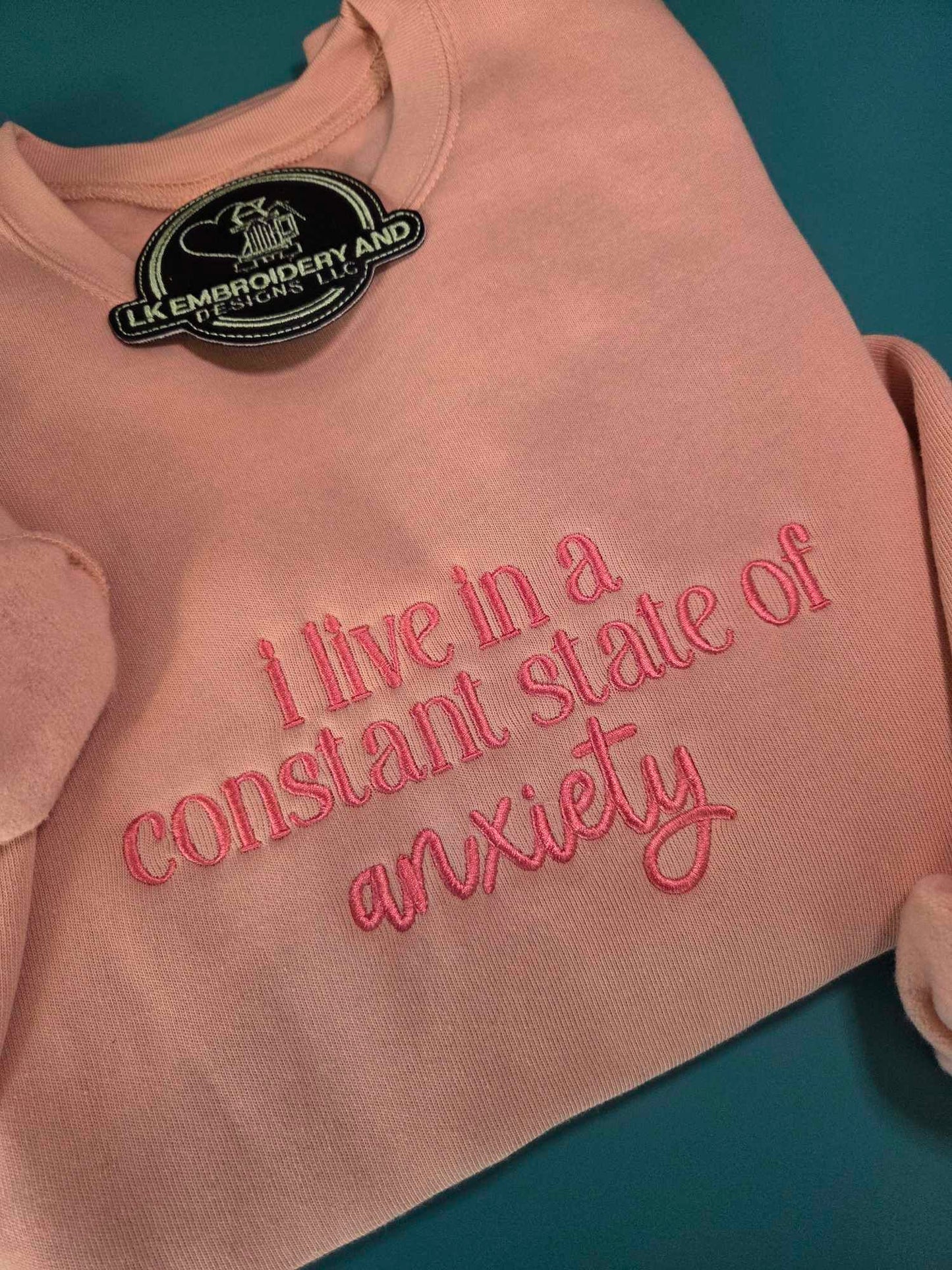 i live in a constant state of anxiety Embroidered Crewneck Sweatshirt