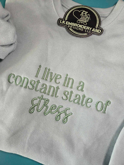 i live in a constant state of stress Embroidered Crewneck Sweatshirt